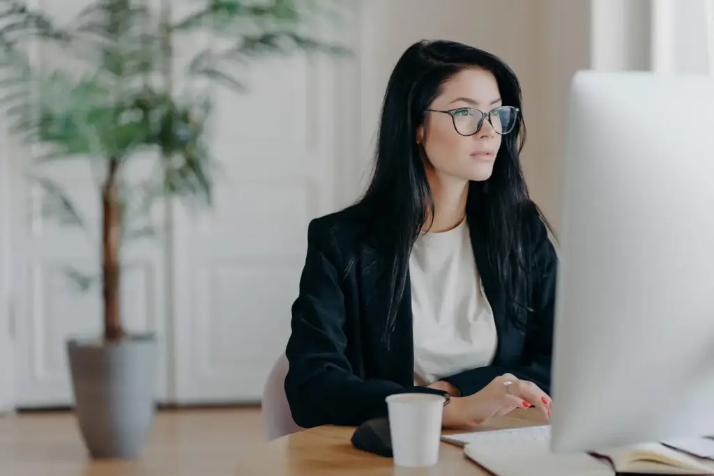 Professional working at a computer from home